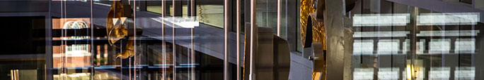 College of Business building reflecting windows.