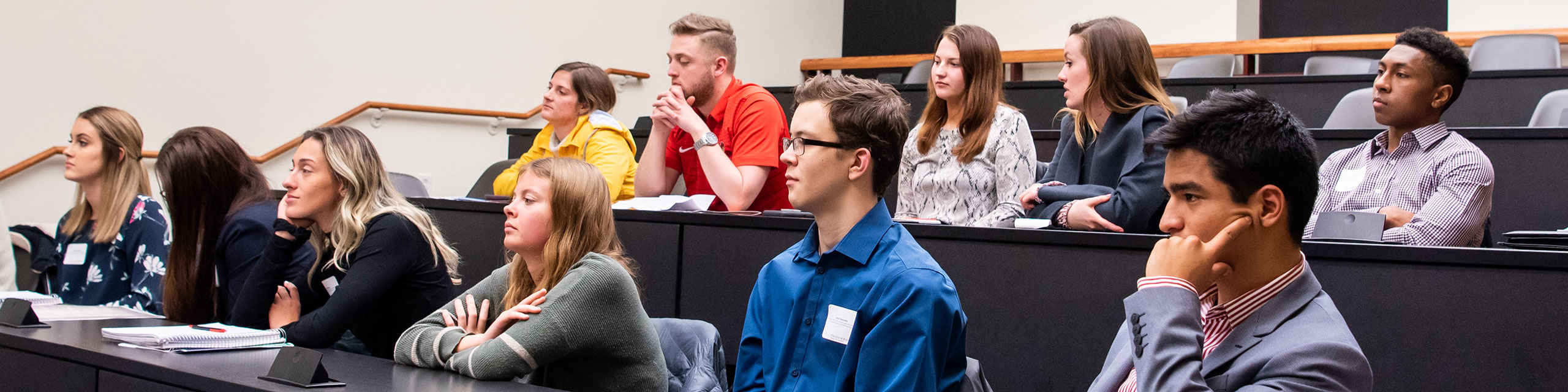 Students watching a lecture in classroom