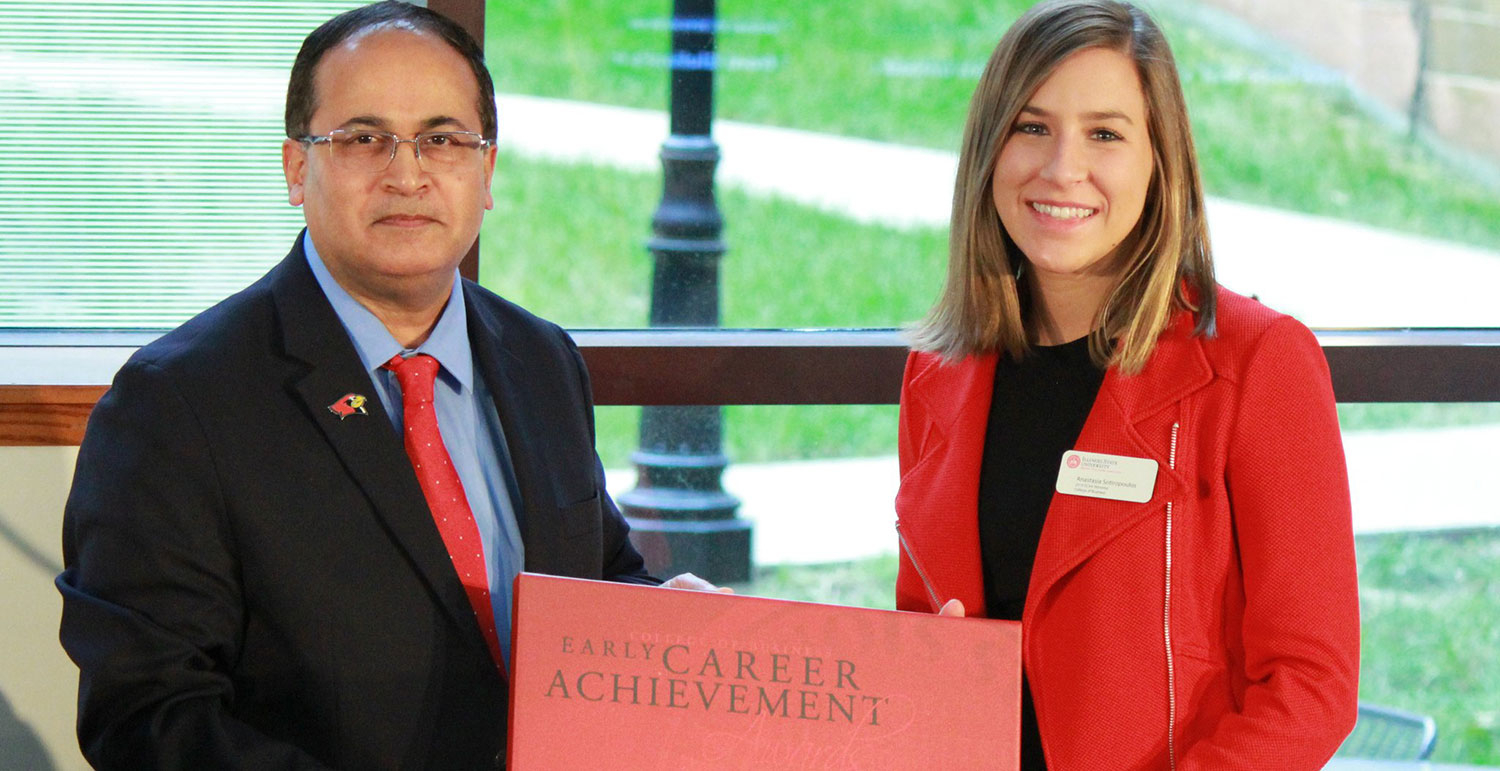 Student Anastasia Sotiropoulos receiving an Early Career Achievement Awards.